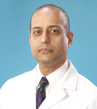 Raj Pande, DMD<br>Dentist